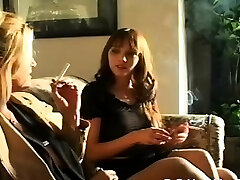 Obscene bitch fascinating her man while smoking a cigarette