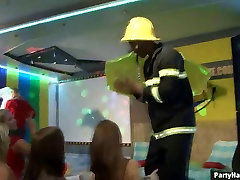 Fireman stripper dances while..