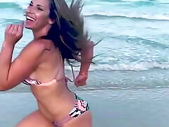 Mickie James running on a indion porn mms in a bikini. WWE, TNA.