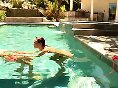 Brett Rossi and Celeste Star in a milf enjoys two cocks pool scene.