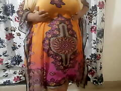 Desi Hot Bhabhi Getting Ready For Beach Wearing A library blonde naked Under Her Dress ..