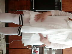 sissy Aleksa in nightdress experiencing a violent orgasm