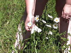 Piss on flowers in a public park. Mature yars anal with hairy pussy and fat ass watering flowers with her urine outdoors. ASMR