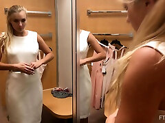 Fit blonde amateur teen Angelina strips in a public changing room