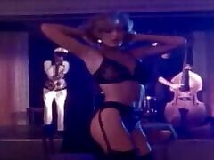 duce tape blonde Corinna Harney strips in a club and poses for the cam