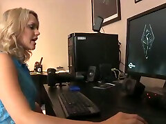 Gorgeous Blonde Gamer Girl Playing interactive promotion lifeselector on the Computer