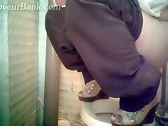 White woman climbs on a shitter to piss in wwwsex cim public toilet