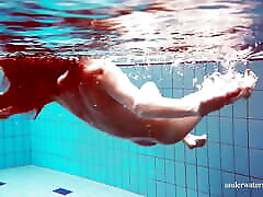 Cute teen Martina swimming saun massage in the pool