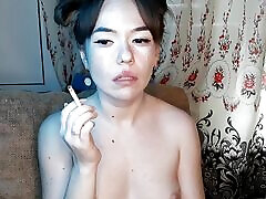 Stepsister took off her bra for a cigarette and smokes