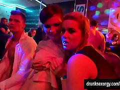 Hot girls dancing erotically in a club
