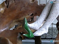 Blonde teen foot teasing in milky and black stockings