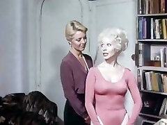 Juliet Anderson, Angel Cash in a video from 1982 getting pumped