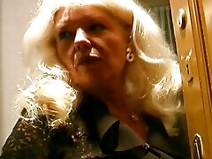 Older and busty German grannie in stockings enjoys making a cock cum