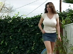 This ever horny MILF seduces a guy with a giant stiff cock and