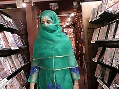 Red-hot Pakistani chick Nadia Ali sucks big dick in the glory hole room