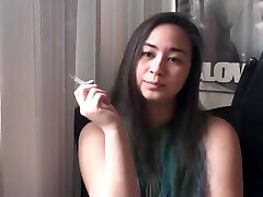 Miss Dee Nicotine having her morning Ciggie