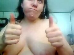 Milky trash whore on webcam chews banana and shows it