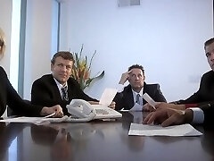 Busty redhead assistant slut deep-throats dicks in office orgy