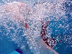 Pretty Polish teen Alice swimming without clothes on