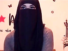 ninja-girl shows hooters and bottom