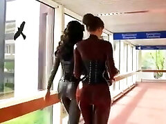 2 hot women in tight spandex catsuits