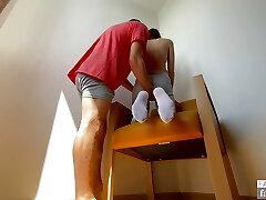 Gigi being chastised by her educator for drawing prick on the desk