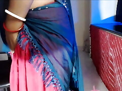 Sexy woman takes off her bra and gets bare, presses her knockers and does pussy fingering.