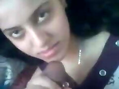 Cute girlfriend sensually gobbles the dick head