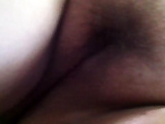 Licking her hairy pussy